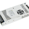 Metal-cased switching power supply with ventilation slots and a screw-terminal block at the end.
