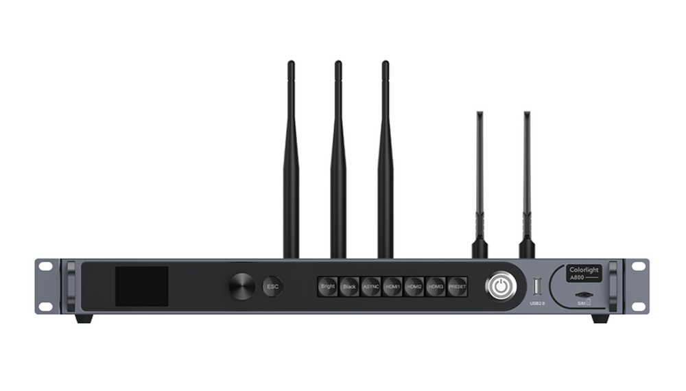 Rack-mount network appliance with four external antennas and a front panel of buttons and a power dial.