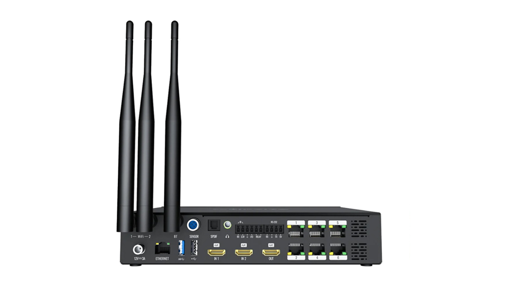 AX06 2 - LED-Mall, Shopping LED Controller & LED Display Parts Black wireless router with three external antennas and multiple Ethernet ports visible from the rear panel, set against a white background.