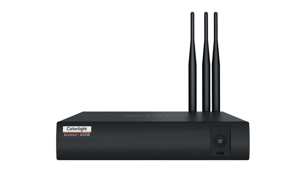 Black wireless router with three tall external antennas and a front power button, labeled 'ColorLight Acrobat AX08'