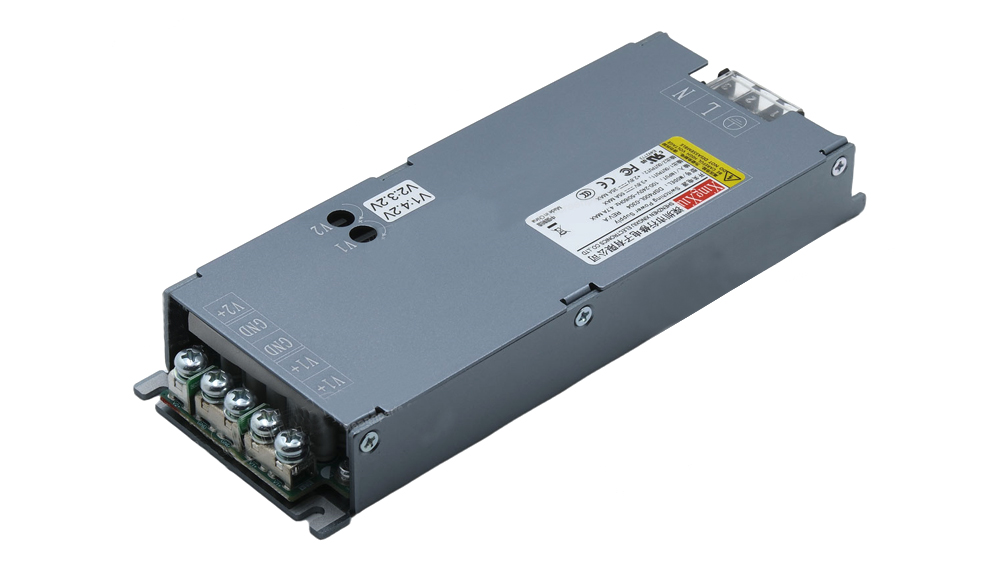 Metal enclosed DC power supply with screw-terminal block at the end for output connections +V, -V, GND (industrial module).