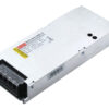 Industrial power supply unit with a 4-terminal output block on a metal enclosure; includes warning label on top surface.