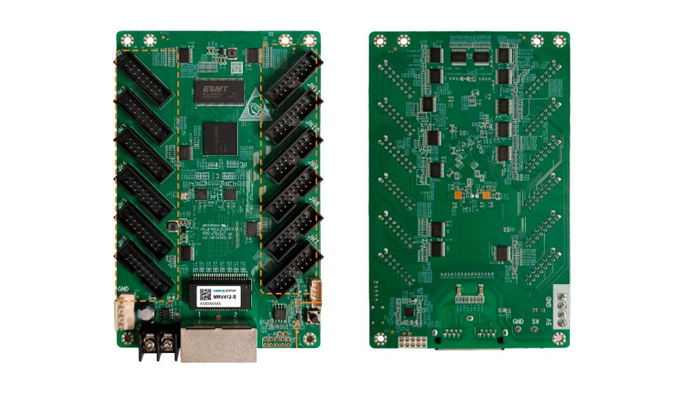 Two green printed circuit boards shown side by side, each densely populated with black pin headers around the edges and a USB-like connector at the bottom, likely development or controller boards.